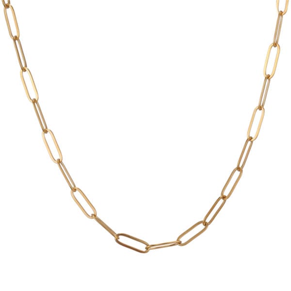 A gold chain necklace with a large link.