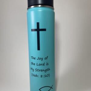 A blue water bottle with a cross on it.